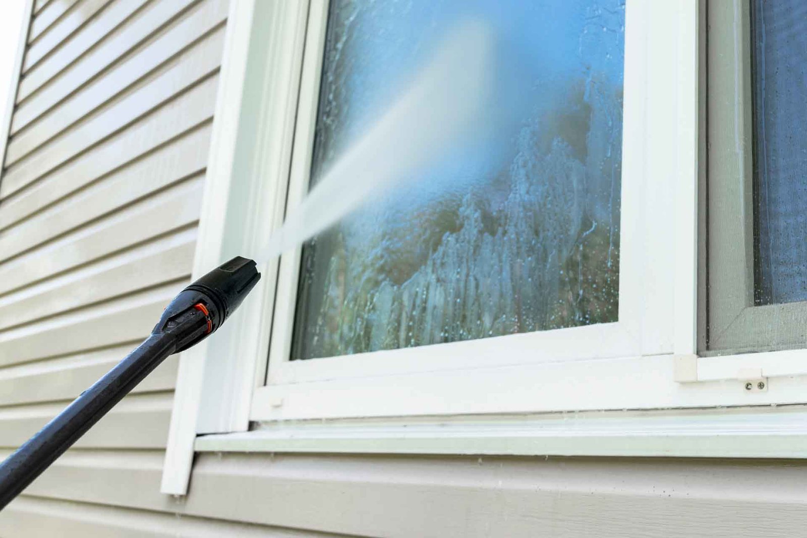 Stain removal with pressure washing