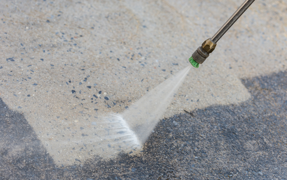 someone pressure washing 
