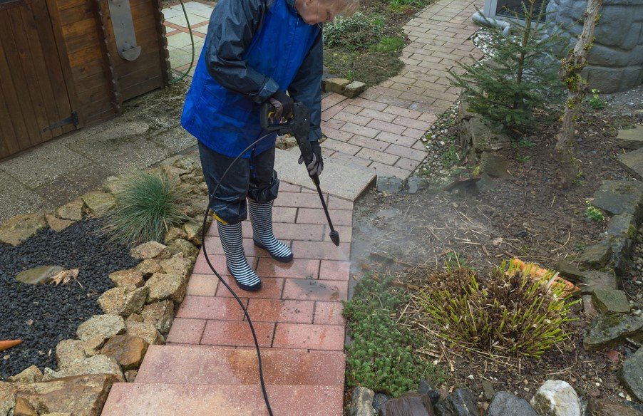 Stain removal with pressure washing