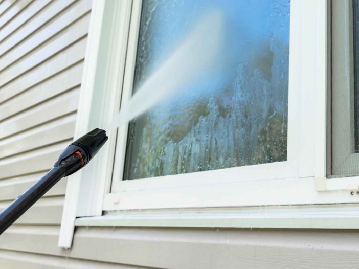 Stain removal with pressure washing